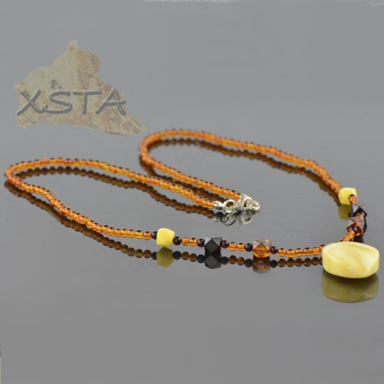 Long amber necklace with mix beads